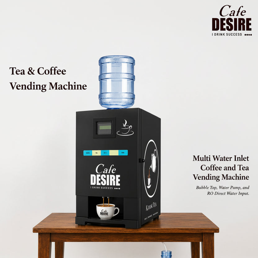 Cafe Desire multi water inlet coffee and tea vending machine shown on a wooden table with a large water bottle connected to its top inlet. The black machine features the Cafe Desire logo, a digital display, and a cup of coffee dripping from the dispensing port.